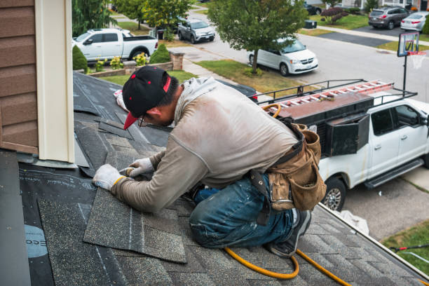 Professional Roofing technician working in Sheridan, TX